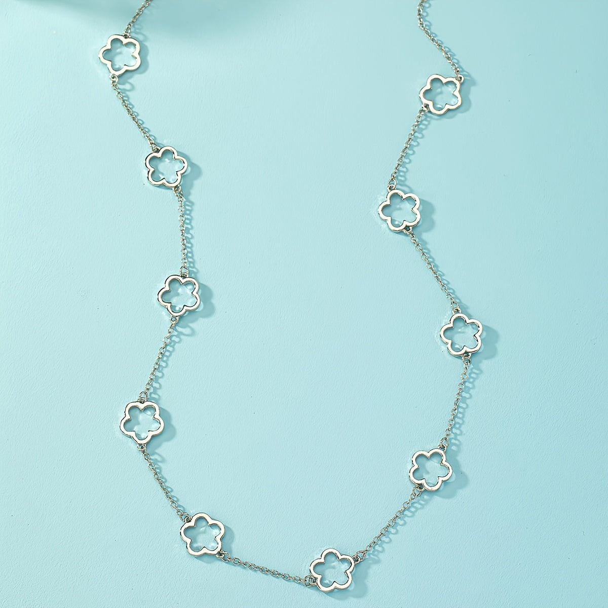 Elegant Geometric Floral Necklace for Women - Hollow Design with Long Chain - Graceland Home and Living -